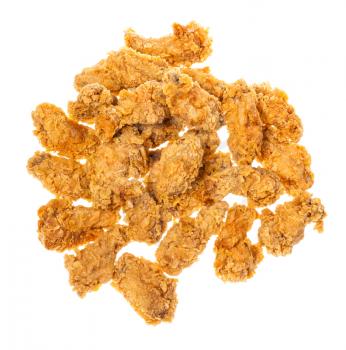 top view of heap of crispy batter deep-fried chicken wings isolated on white background