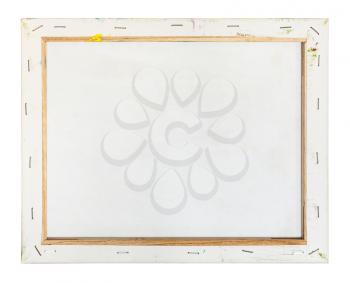 back side of primed artistic canvas stretched over wooden frame isolated on white background