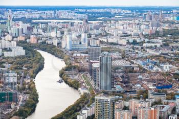 above view of west of Moscow city with Moskva river from observation deck at the top of OKO tower in autumn dusk