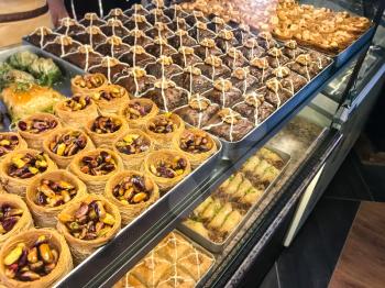 travel to Caucasian Mineral Waters region - various baklava local sweets in pastry shop in Pyatigorsk city