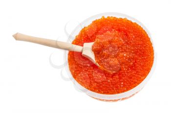 top view of plastic container with salted russian red roe of pink salmon fish and big wooden spoon isolated on white background