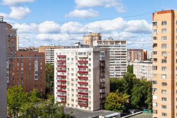 residential district with high-rise houses in Moscow city in sunny summer day
