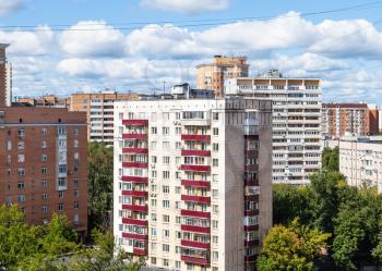 concrete-paneled house in residential district in Moscow city in sunny summer day