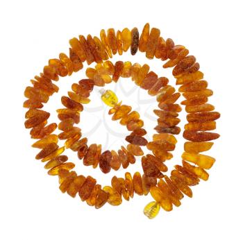 top view of spiral necklace from natural rough amber nuggets isolated on white background