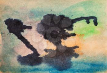 abstract painted watercolor painting with black blots on brown kraft paper