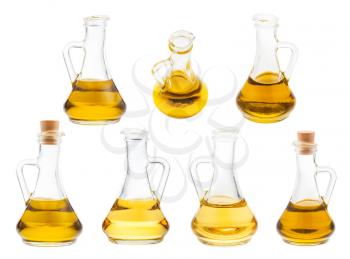 set of glass jug with oils isolated on white background