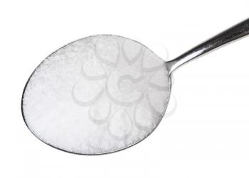 top view of tablespoon with fine ground Sea Salt close up isolated on white background
