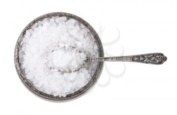 top view of old silver salt cellar with spoon with coarse grained Sea Salt isolated on white background