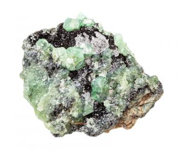 closeup of sample of natural mineral from geological collection - druse of raw Demantoid (green andradite garnet, Uralian emerald) crystals isolated on white background