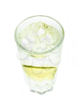 above view of gin and tonic cocktail in highball glass with slices of lime and cubes of ice isolated on white background