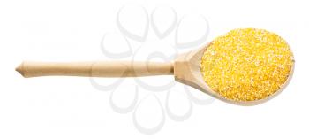 wooden spoon with uncooked coarse maize cornmeal isolated on white background