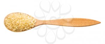 top view of demerara brown cane sugar in wood spoon isolated on white background