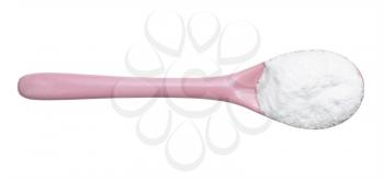 top view of dextrose sugar in pink ceramic spoon isolated on white background