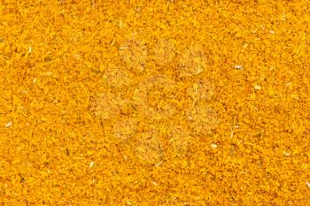 food background - ground dried tagetes (imeretian saffron)