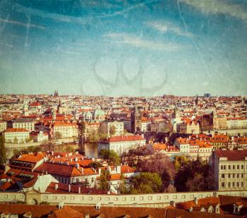 Vintage retro hipster style travel image of aerial view of Prague from Prague Castle. Prague, Czech Republic with grunge texture overlaid