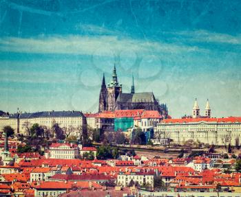 Vintage retro hipster style travel image of  Hradchany: the Saint Vitus (St. Vitt's) Cathedral and Prague Castle, Prague, Czech Republic with grunge texture overlaid