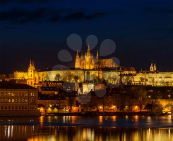 Travel Prague Europe concept background - view of Charles Bridge and Prague Castle in twilight. Prague, Czech Republic
