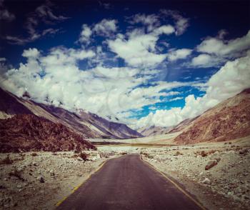 Vintage retro effect filtered hipster style travel image of Road in Himalayan landscape in Nubra valley in Himalayas. Ladakh, India