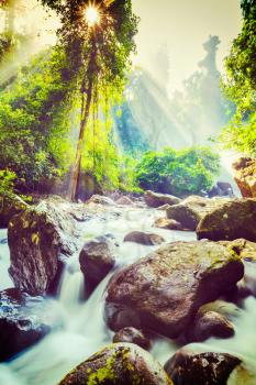 Vintage retro effect filtered hipster style image of tropical waterfall Phnom Kulen, Cambodia