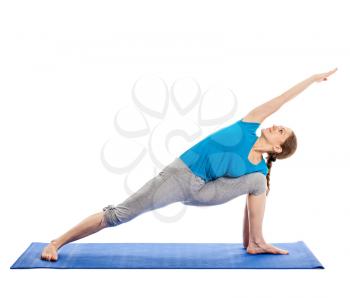 Yoga - young beautiful slender woman yoga instructor doing Extended Sides Angle Pose (Utthita Parsvakonasana) asana exercise isolated on white background
