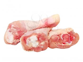 Uncooked chicken legs isolated on white background.