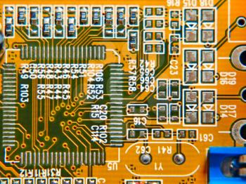 Electronic microcircuit taken closeup suitable as background.