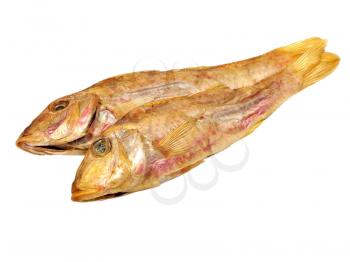 Two dried goatfish taken closeup isolated on a white background.