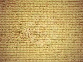The knit rough fabric texture pattern as abstract background.