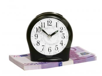Black clock and euro stack isolated on white background.