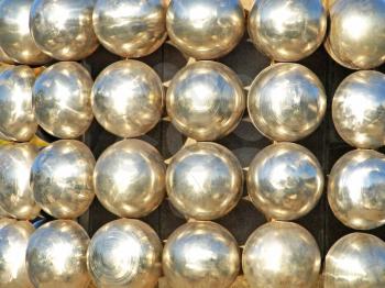 Sparkling metallic balls taken closeup as background .
