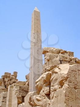 Obelisk on  blue sky background in the Karnak temple.