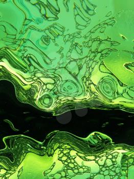 Stylized green liquid texture.Digitally generated image.