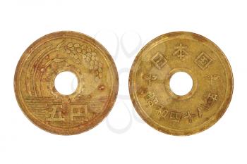 Japanese five yen coin isolated on white background taken closeup.