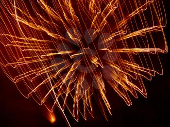 Golden Fireworks Burst in a Darkness as Abstract Background.