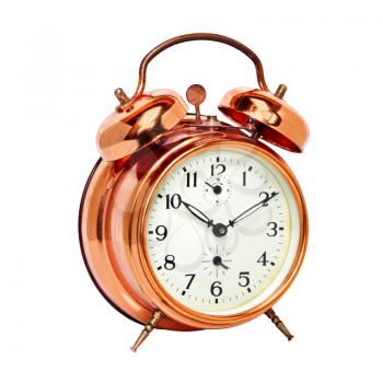Bronze vintage alarm clock isolated on white background.