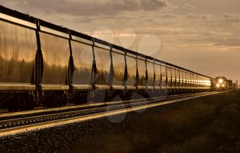 Train at Sunset late day Saskatchewan Canada