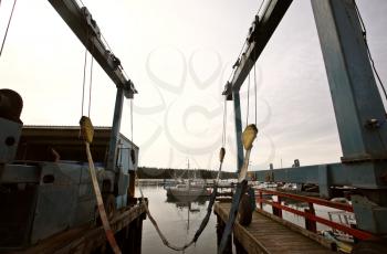 Boat lift and docked fishing boats at Port Edward, British Columbia