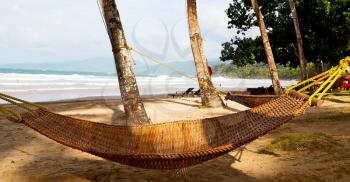 in  philippines  view from an hammock  near ocean beach and sky concept of relax
