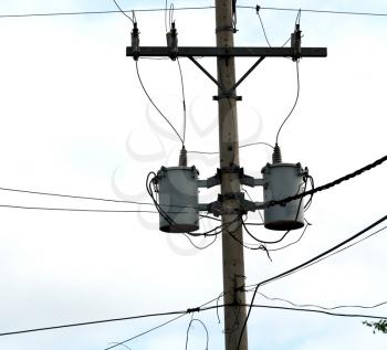 blur  in  philippines   a electric pole with transformer and wire  the cloudy sky