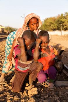 ETHIOPIA,DANAKIL-CIRCA  JANUARY 2018--unidentified   little kids near the  railway
