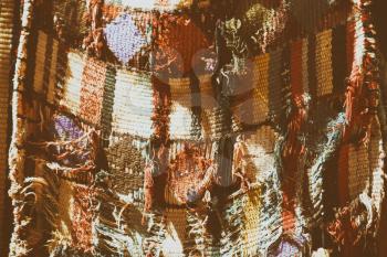 abstract texture of a colorful blanket patchwork like background
