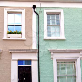 notting hill in london england old suburban and antique blue  wall door 