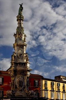 marble statue of obelisk immacolata  in the centre of naples italy church 