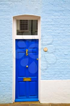 notting hill in london england old suburban and antique wall door 