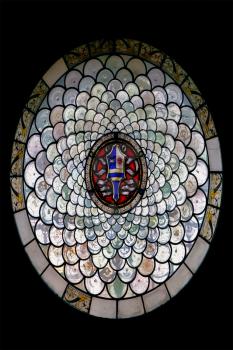 the colored rose window in the church modena  italy 