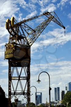 sky clouds and yellow crane in  buenos aires argentina
