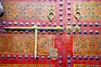 metal brown    morocco in    africa the old wood  facade home and rusty safe padlock 