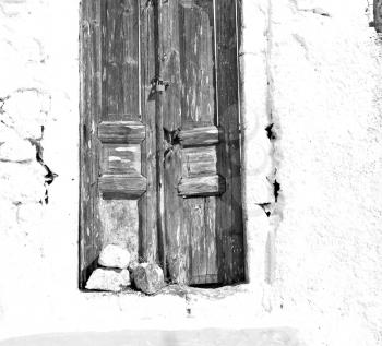 blue door      in antique village santorini greece europe   and white wall