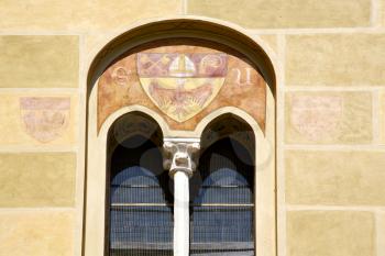 tradate varese italy abstract  window monument curch mosaic in the yellow 