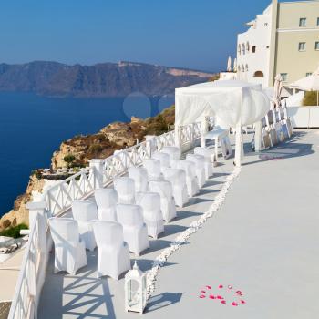 anniversary and marriage cerimony in the sea of santorini greece island europe